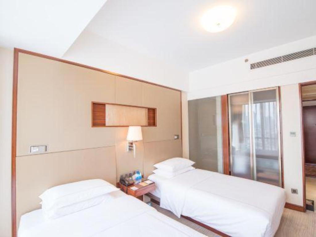 Jinan Silver Plaza Quancheng Hotel Bagian luar foto