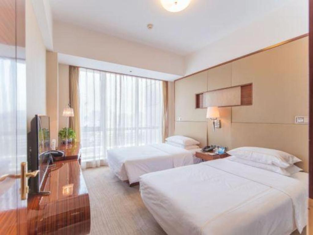 Jinan Silver Plaza Quancheng Hotel Bagian luar foto