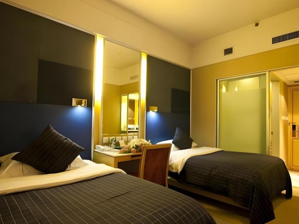 Jinan Silver Plaza Quancheng Hotel Bagian luar foto